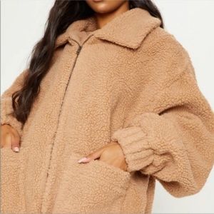 PLT fuzzy bomber jacket.